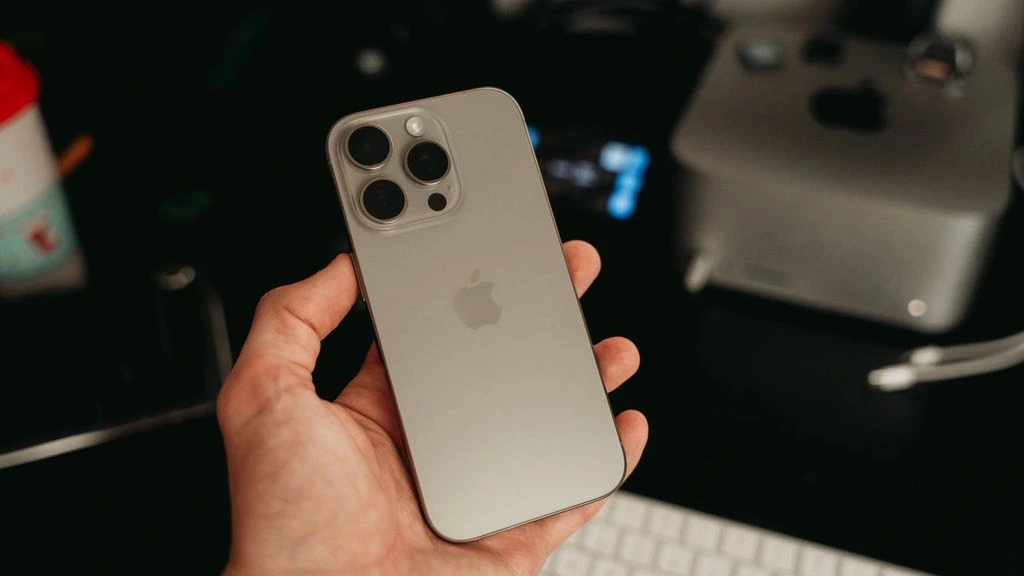 iPhone 16 Pro on a slate surface